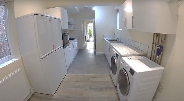 Property photo 3 of 11 A Clean, Well-Lit Kitchen With Modern Appliances, ...
