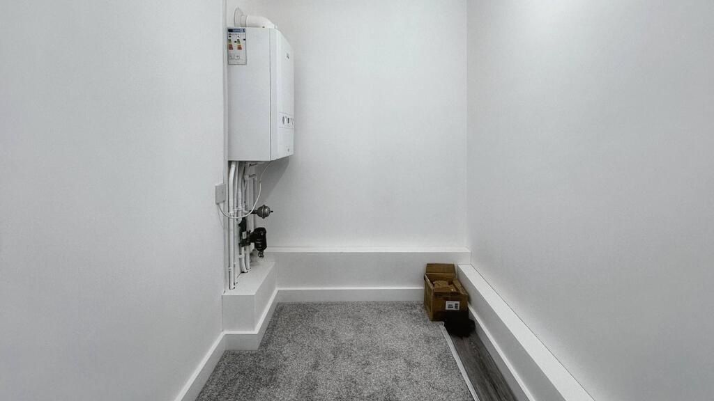 Property photo 3 of 9 Clean, Recently Painted Small Utility/Storage Room...