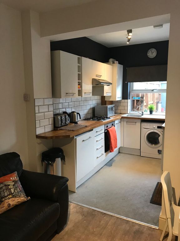 Property photo 1 of 25 Modern Open-Plan Kitchen With White Cabinets, Wood...