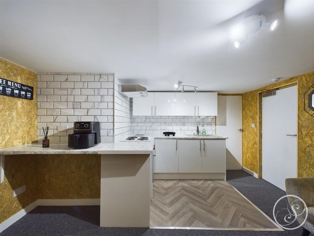 Property photo 2 of 11 Kitchen/Living Area