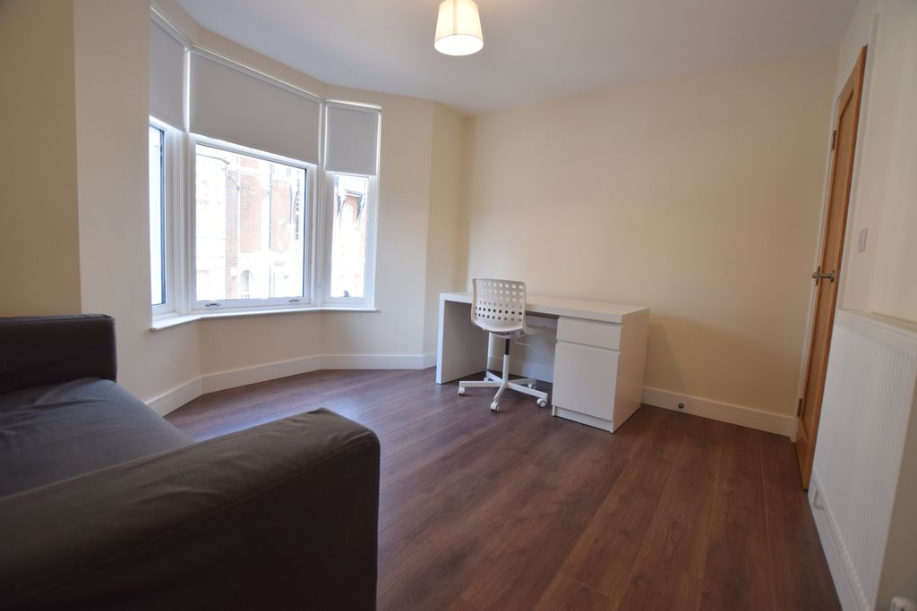 Property photo 2 of 7 Living Area