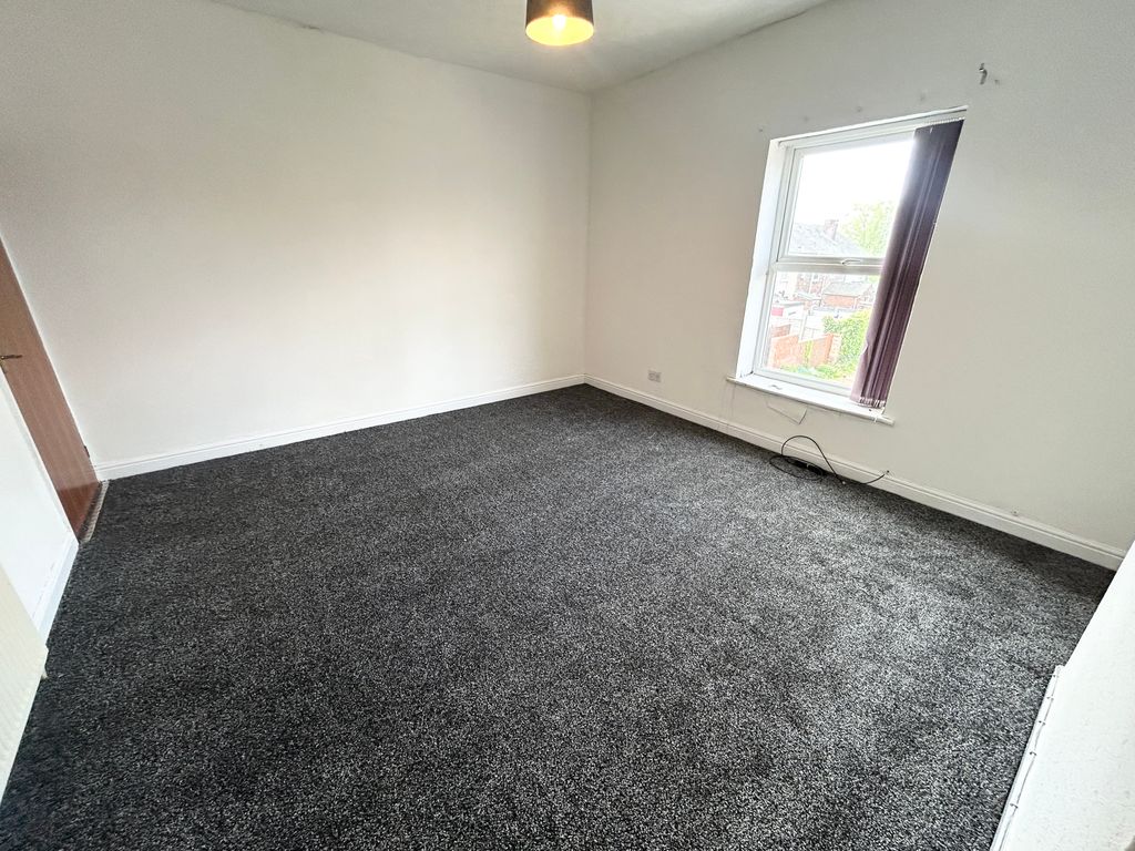 Property photo 3 of 5 Bedroom One