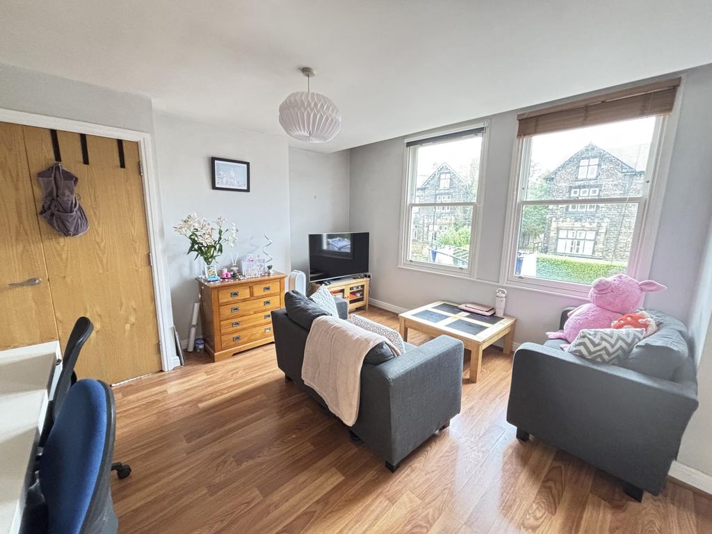 Property photo 2 of 10 Bright And Welcoming Living Room Featuring Ample N...