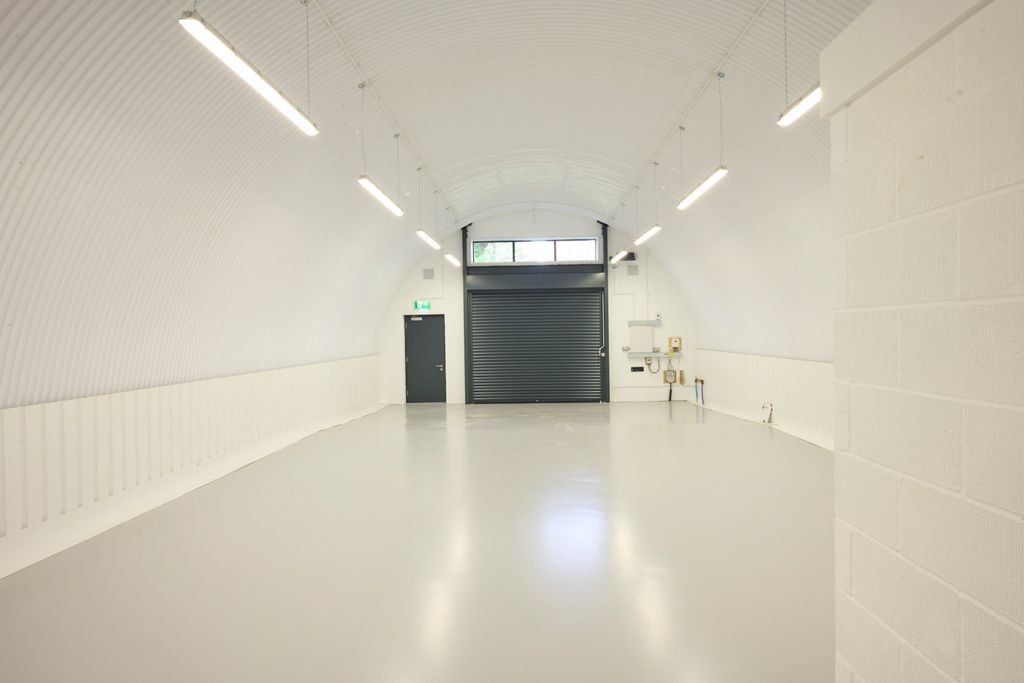 Property photo 1 of 3 The Front Of An Arch With A Closed Electric Roller Shutter Entrance Big Enough For Vehicle Access.