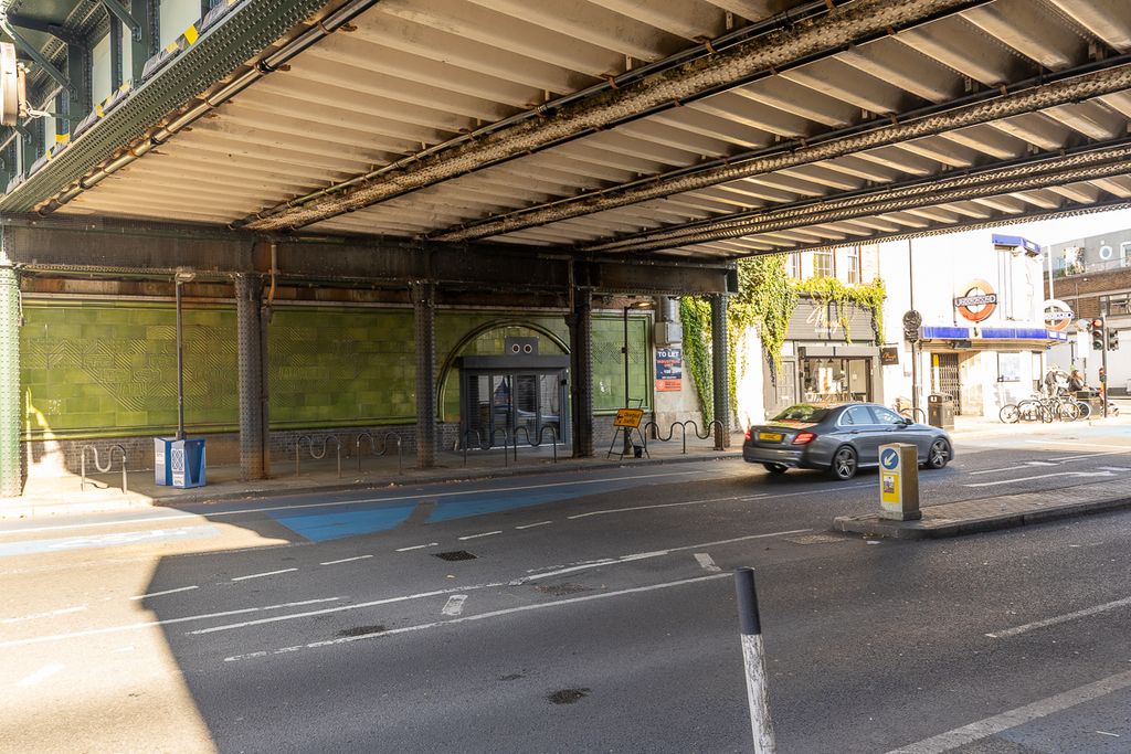 Property photo 2 of 2 The Front Of An Arch, With Glazing On The Bottom Half And Door Allowing You To See Into The Arch Interior.