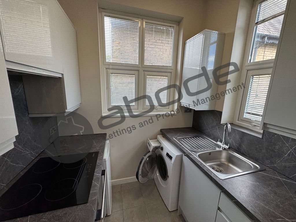Property photo 2 of 12 Kitchen 