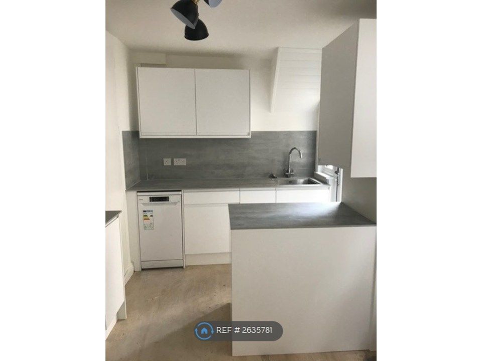 Property photo 2 of 8 Kitchen And Island