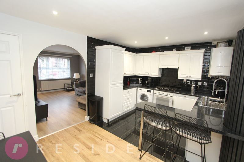 Property photo 3 of 17 Dining Kitchen