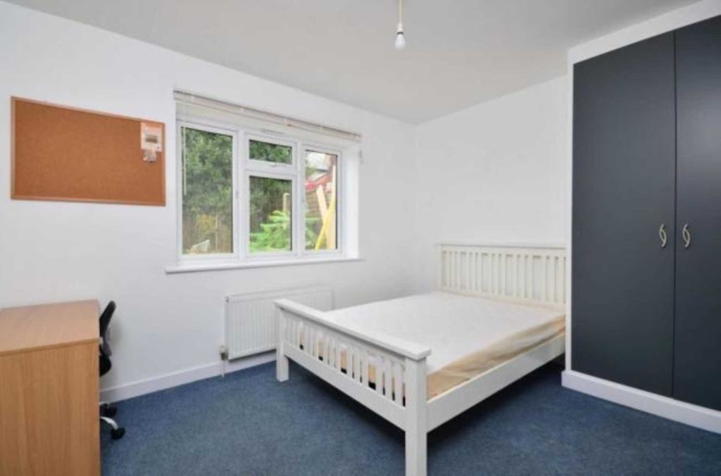 Property photo 3 of 9 Bright, Simply Furnished Bedroom With A Double Bed...