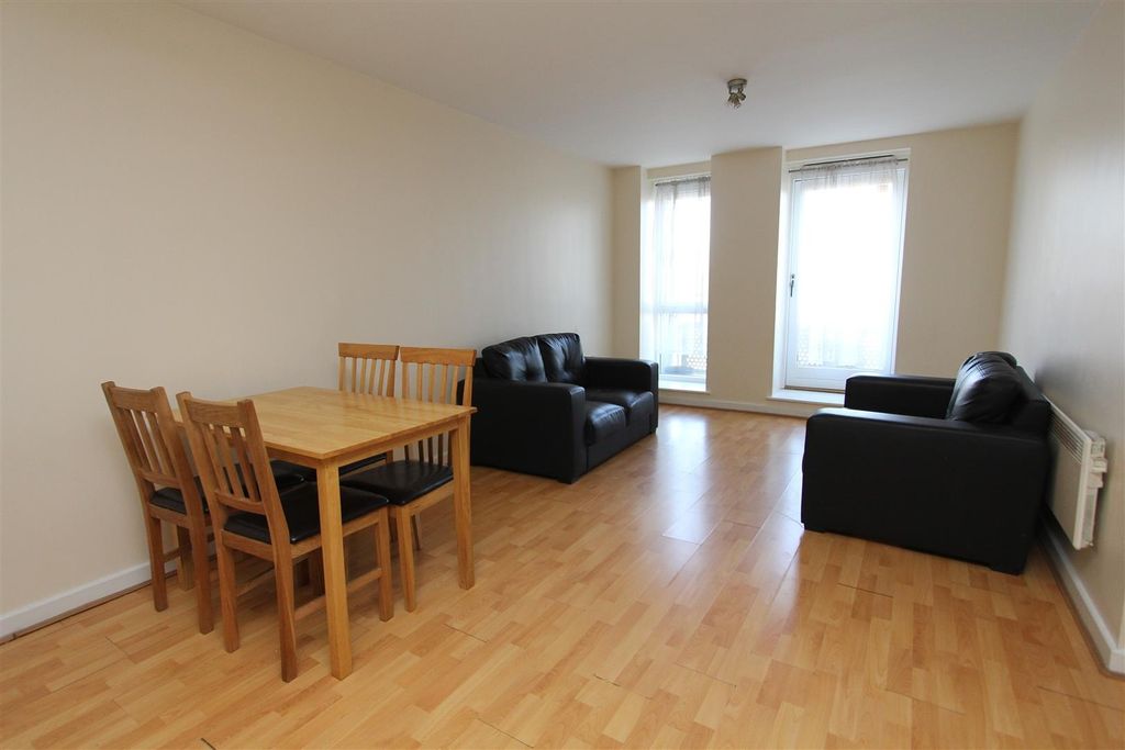 Property photo 3 of 10 Bright Living Area With Modern Sofas And Dining...