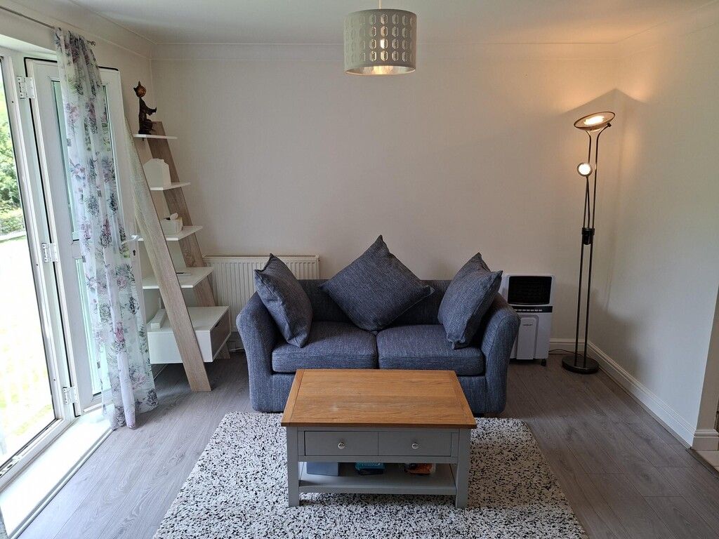 Property photo 2 of 14 Living Area