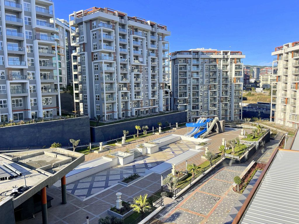 Property photo 1 of 21 Brand New Apartment For Sale In Alanya - Main View Of The Apartment Complex