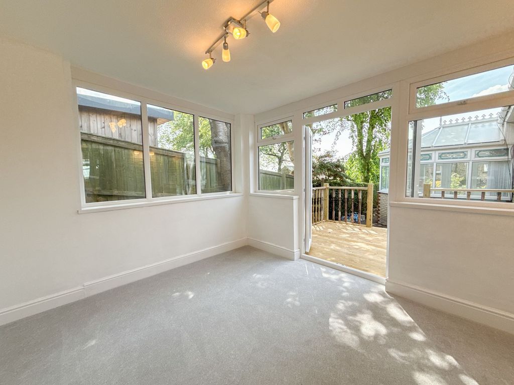 Property photo 3 of 12 Sun Room