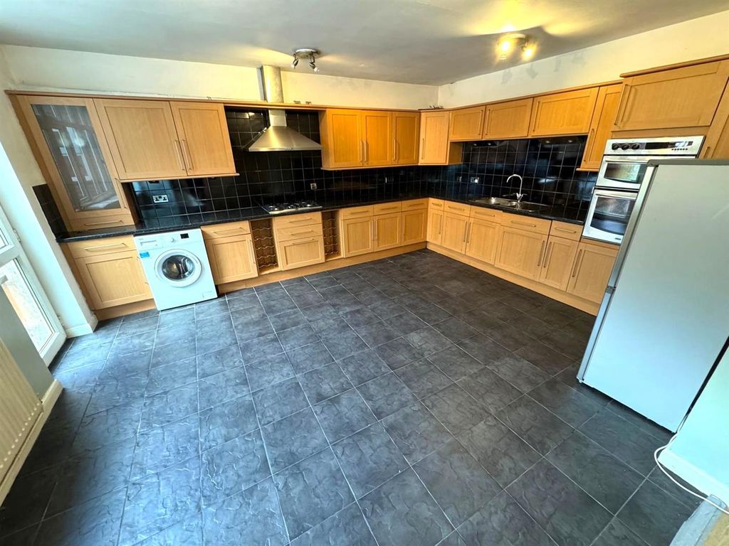 Property photo 2 of 15 Kitchen Area
