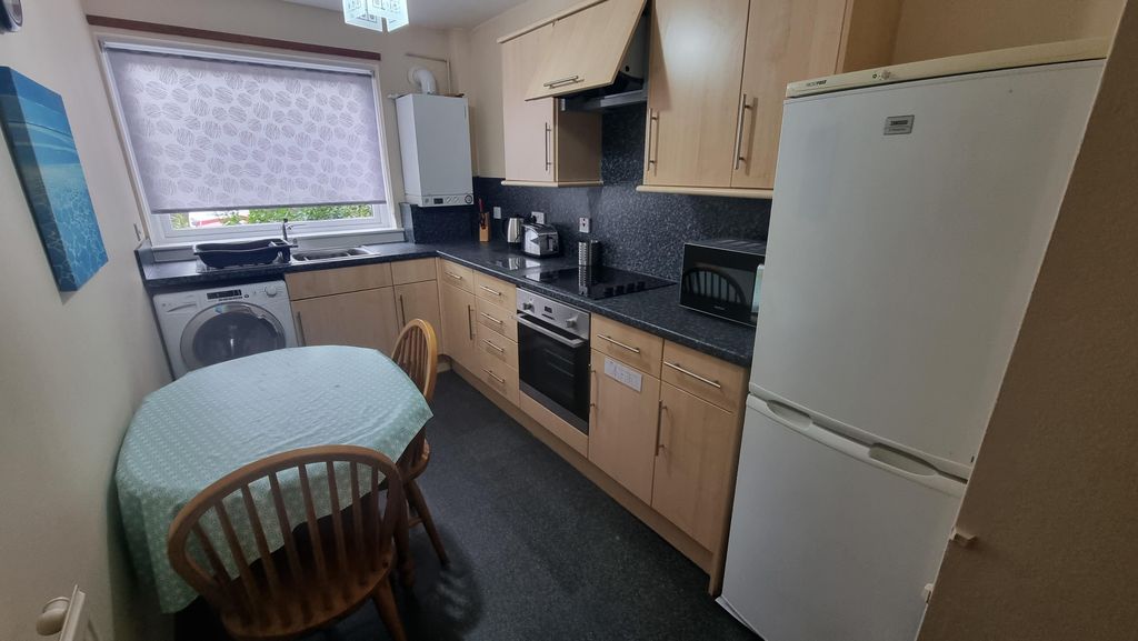 Property photo 2 of 11 Kitchen