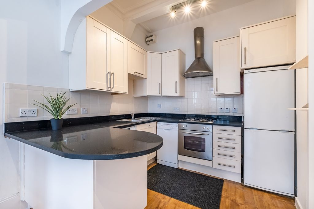 Property photo 3 of 13 Kitchen