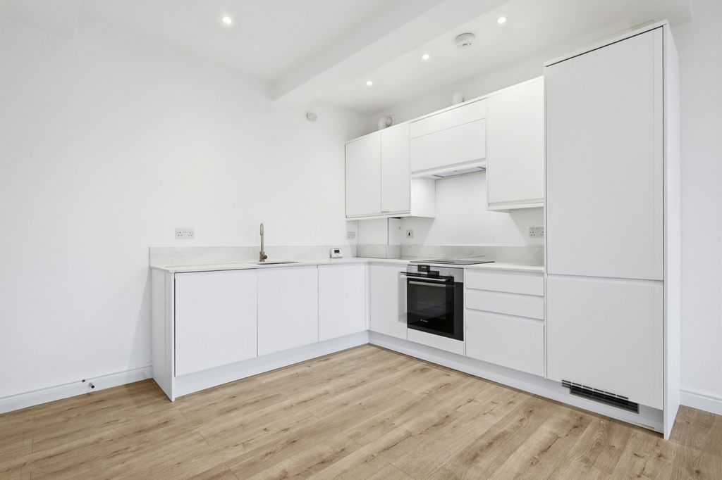 Property photo 3 of 16 Open-Plan Kitchen