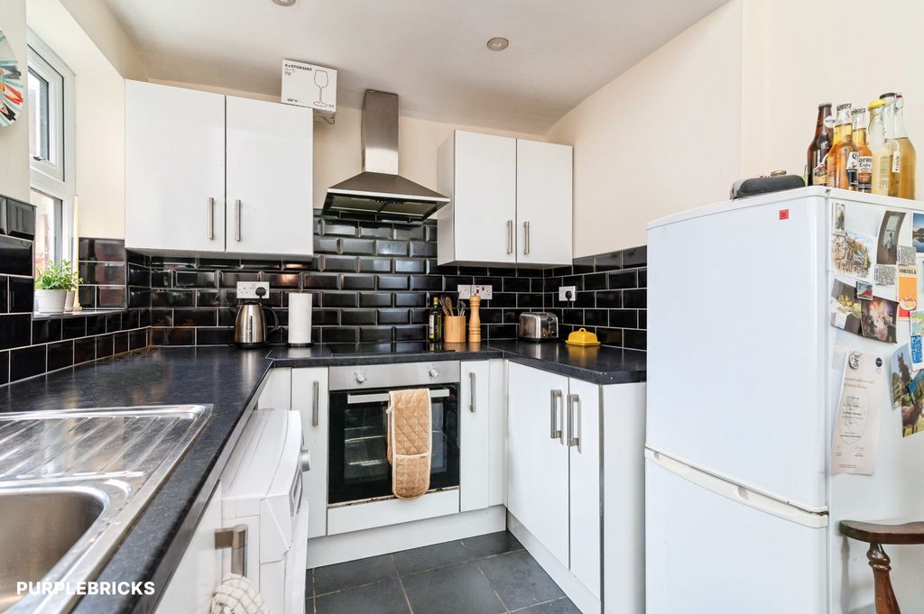 Property photo 2 of 12 Kitchen