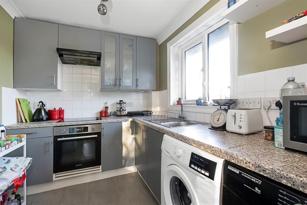 Property photo 3 of 12 Kitchen