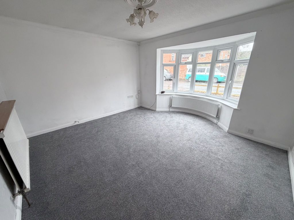 Property photo 3 of 18 Front Left Room