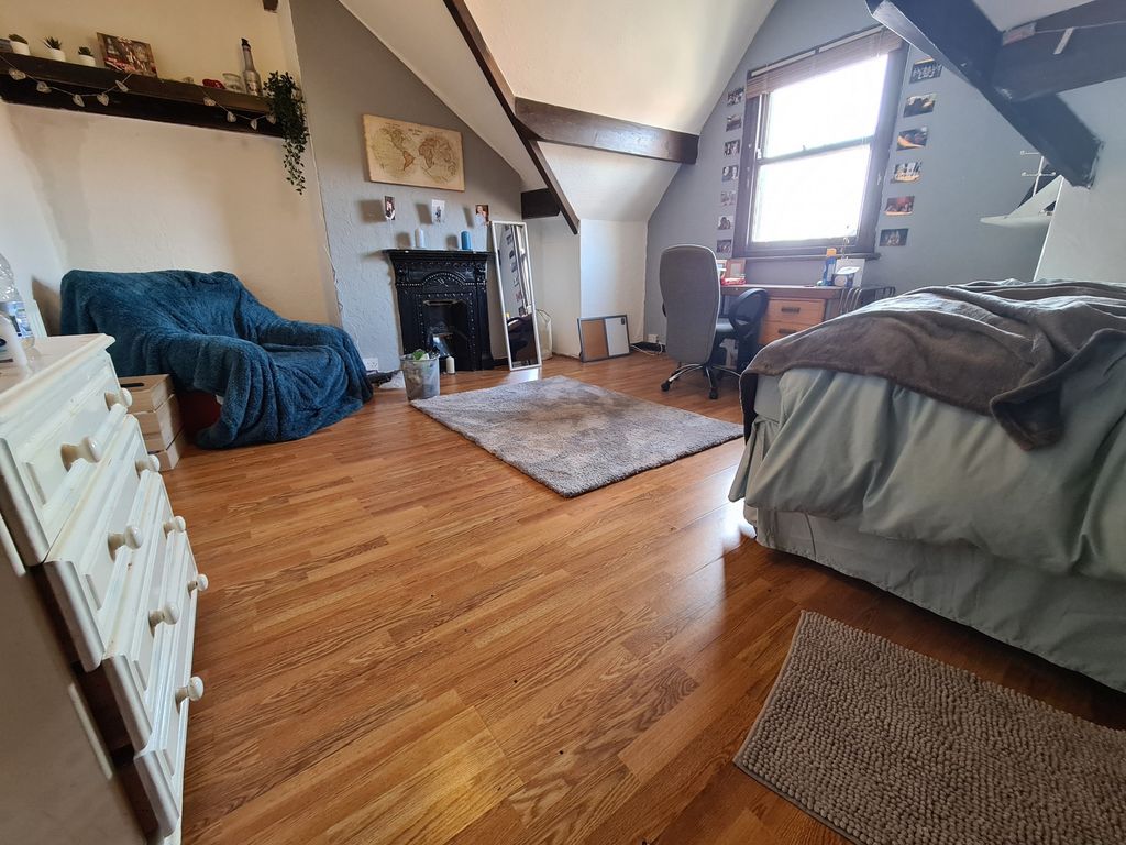 Property photo 1 of 28 A Spacious And Inviting Master Bedroom Featuring A...