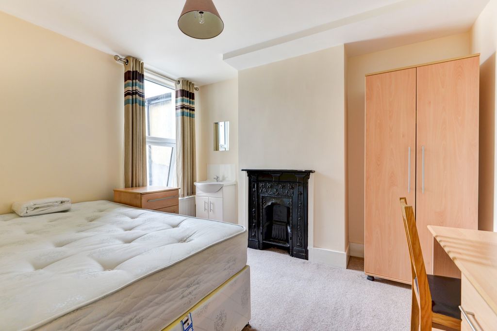 Property photo 2 of 17 A Bright And Inviting Master Bedroom Featuring A l...