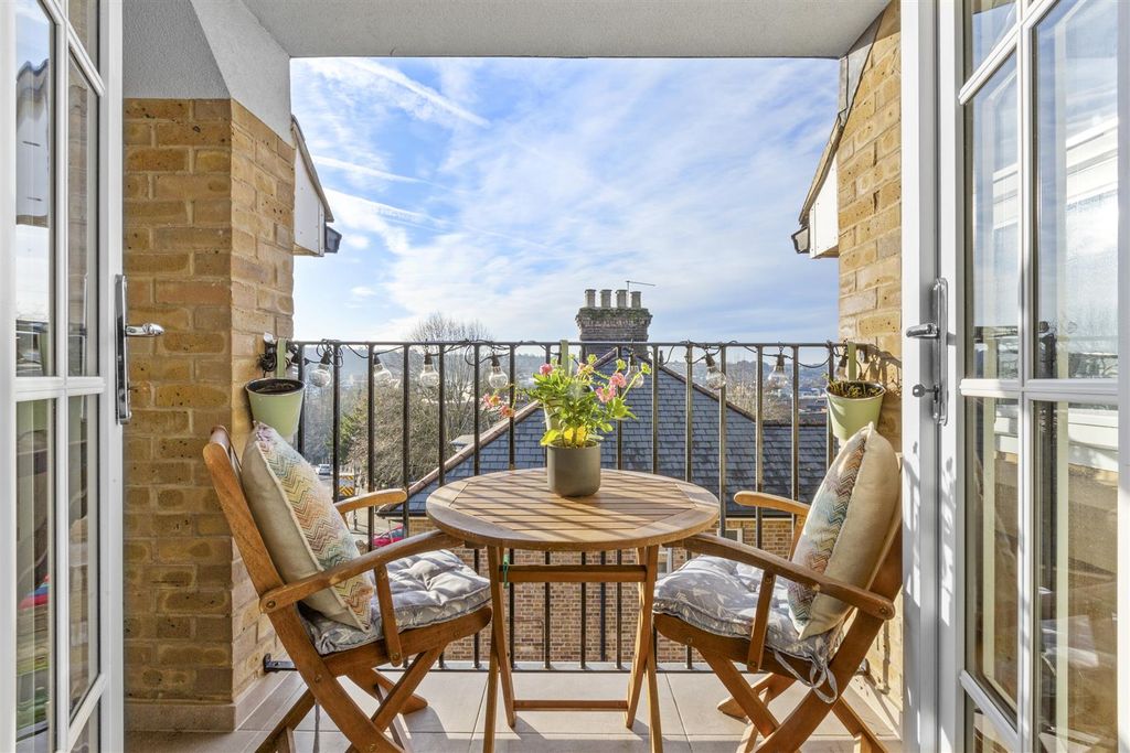 Property photo 2 of 10 Covered Balcony