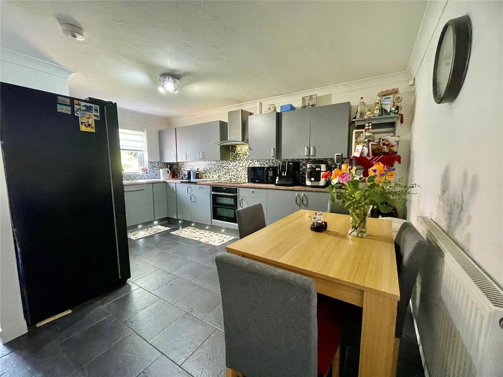 Property photo 3 of 13 Dining Kitchen