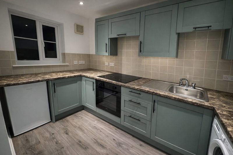 Property photo 2 of 8 Kitchen