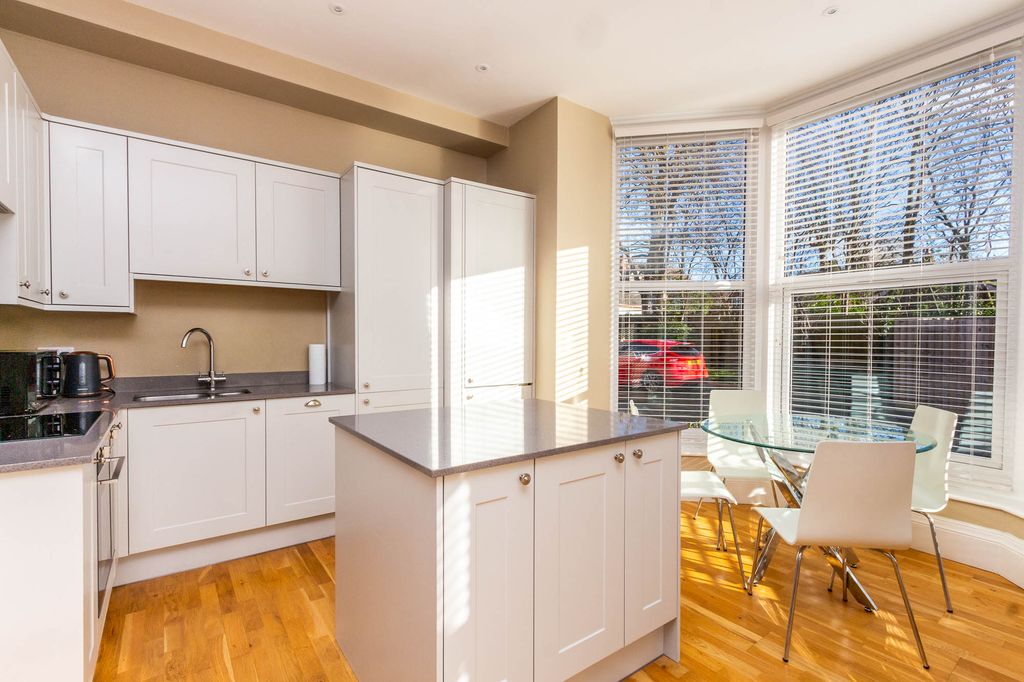 Property photo 3 of 18 Kitchen Area