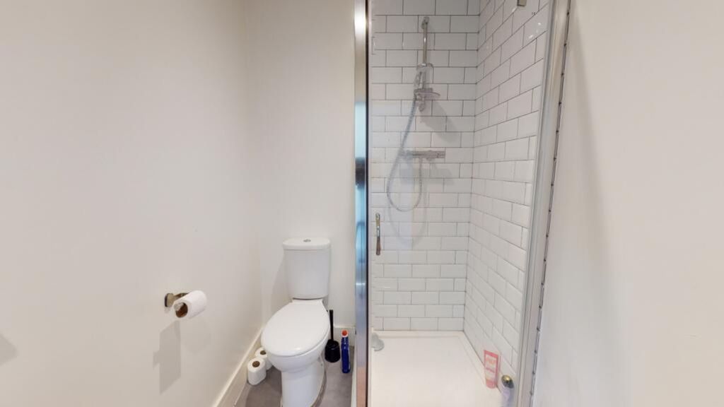 Property photo 1 of 10 A Modern Bathroom Suite Featuring A Sleek Shower A...