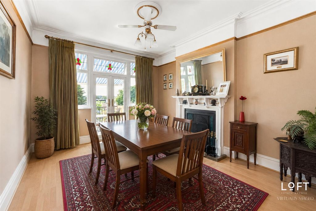 Property photo 3 of 16 Virtually Staged Dining Room