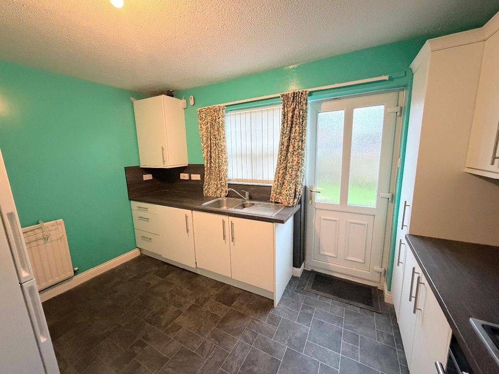 Property photo 3 of 9 Breakfast Kitchen