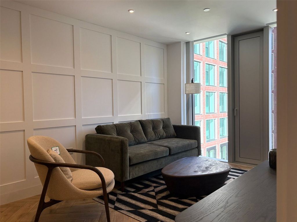 Property photo 3 of 12 Living Area