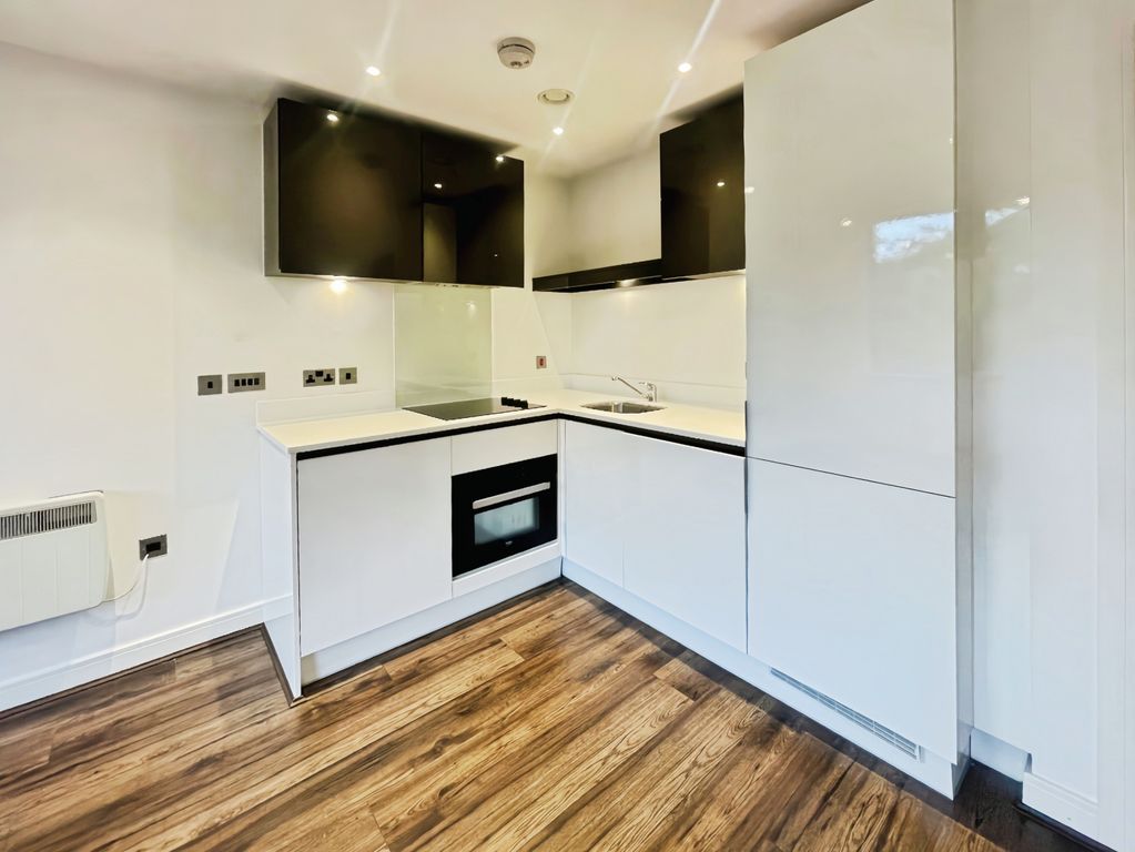 Property photo 3 of 8 Kitchen Area