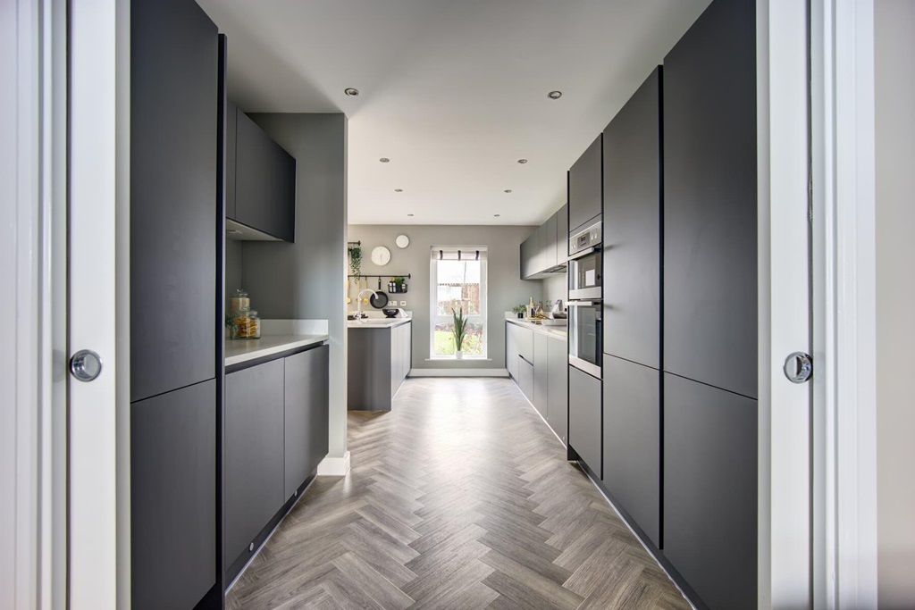 Property photo 3 of 12 A Modern Kitchen Area With Ample Storage
