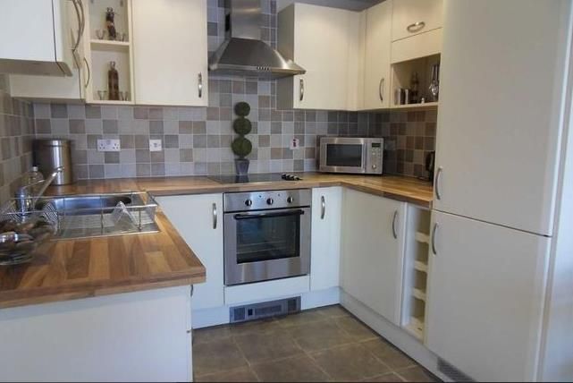 Property photo 3 of 8 Kitchen