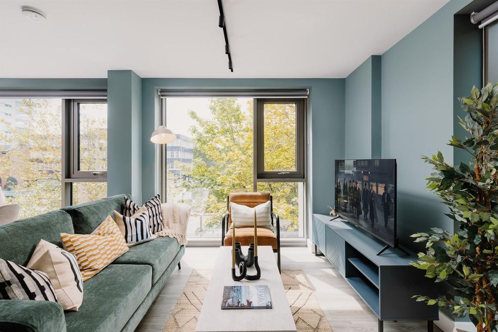 Property photo 1 of 16 Living Area