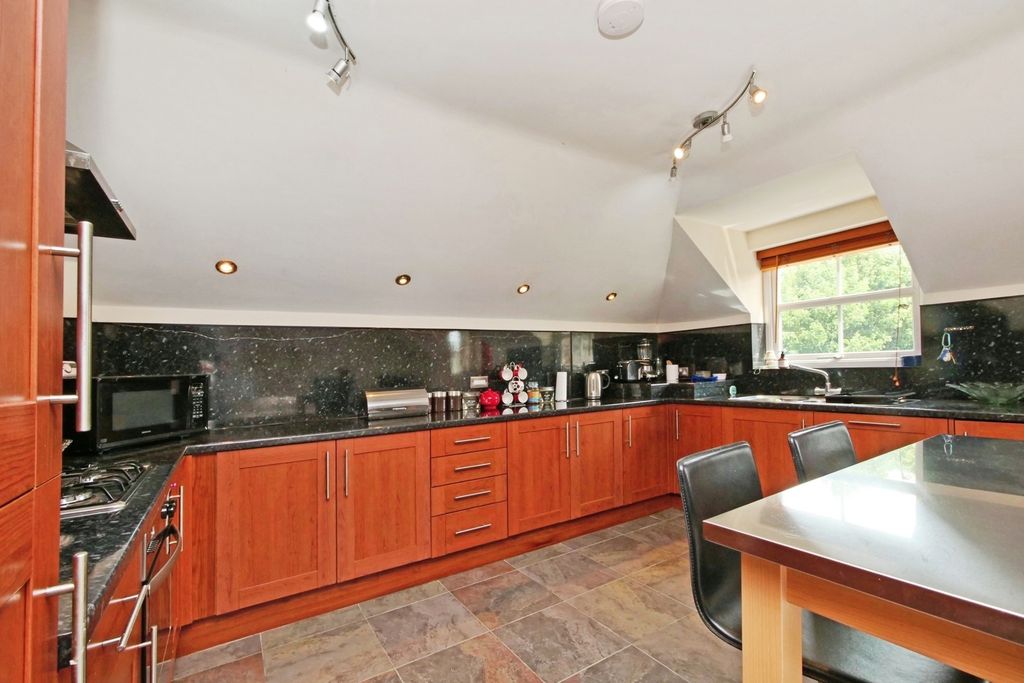Property photo 3 of 12 Kitchen