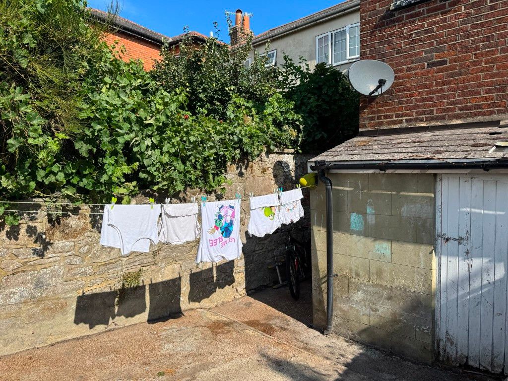 Property photo 3 of 6 Rear Garden With Concrete Patio