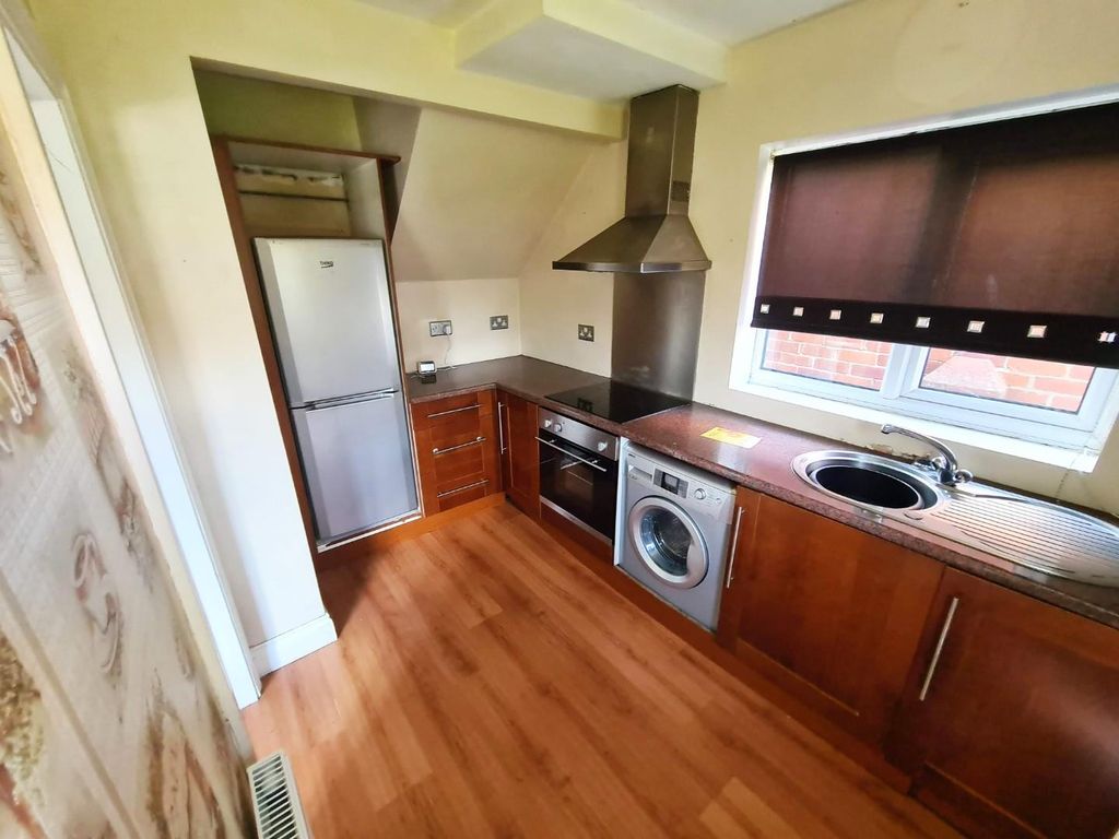 Property photo 2 of 8 Kitchen