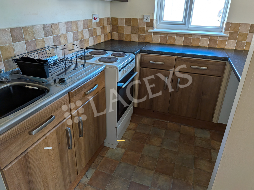 Property photo 2 of 8 Kitchen
