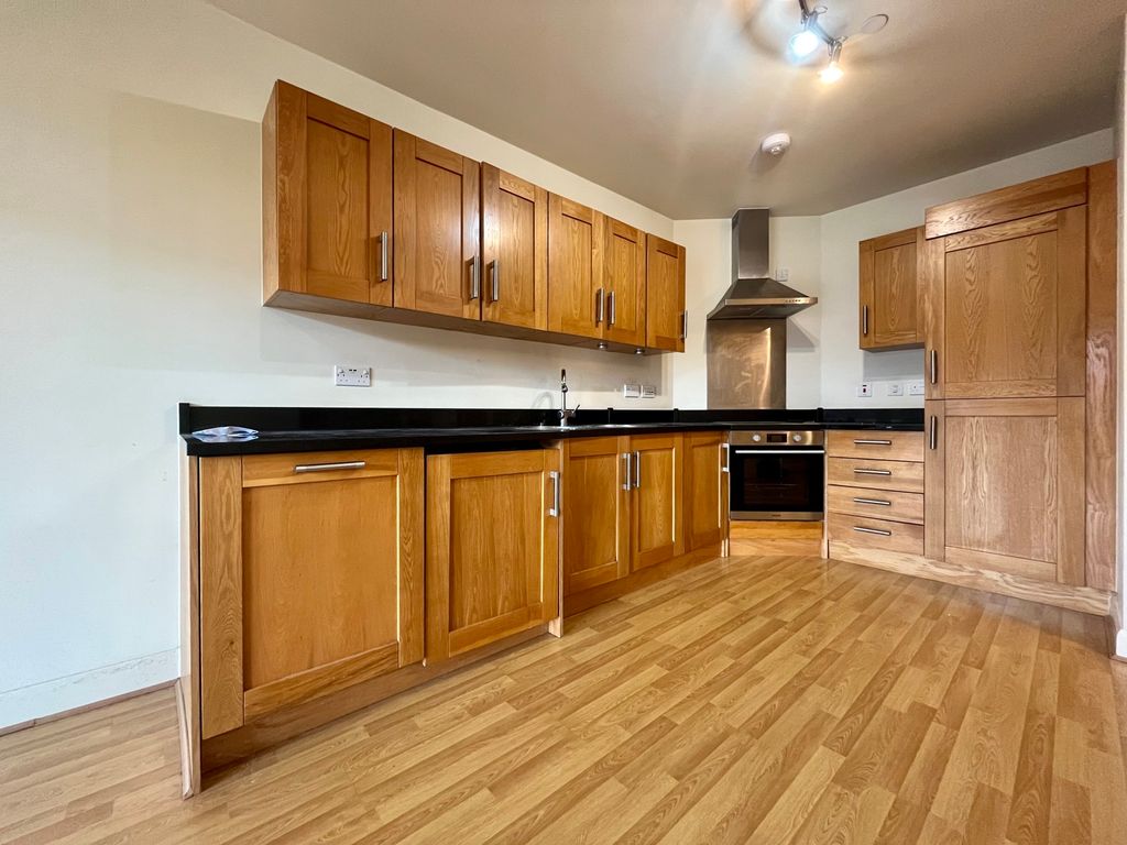 Property photo 3 of 8 Kitchen