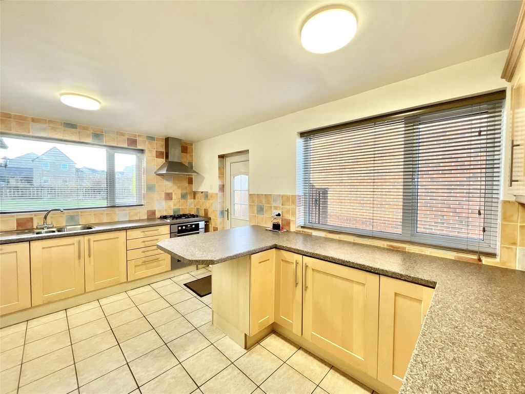 Property photo 2 of 12 Kitchen