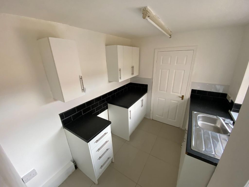 Property photo 2 of 12 Kitchen