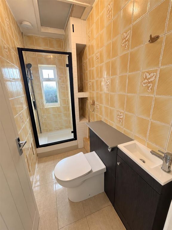 Property photo 3 of 7 Warm Beige Compact Bathroom Retreat.Png