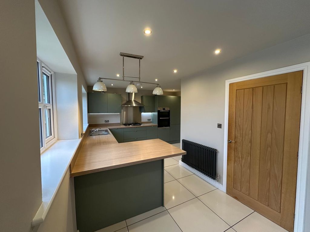 Property photo 3 of 13 Kitchen