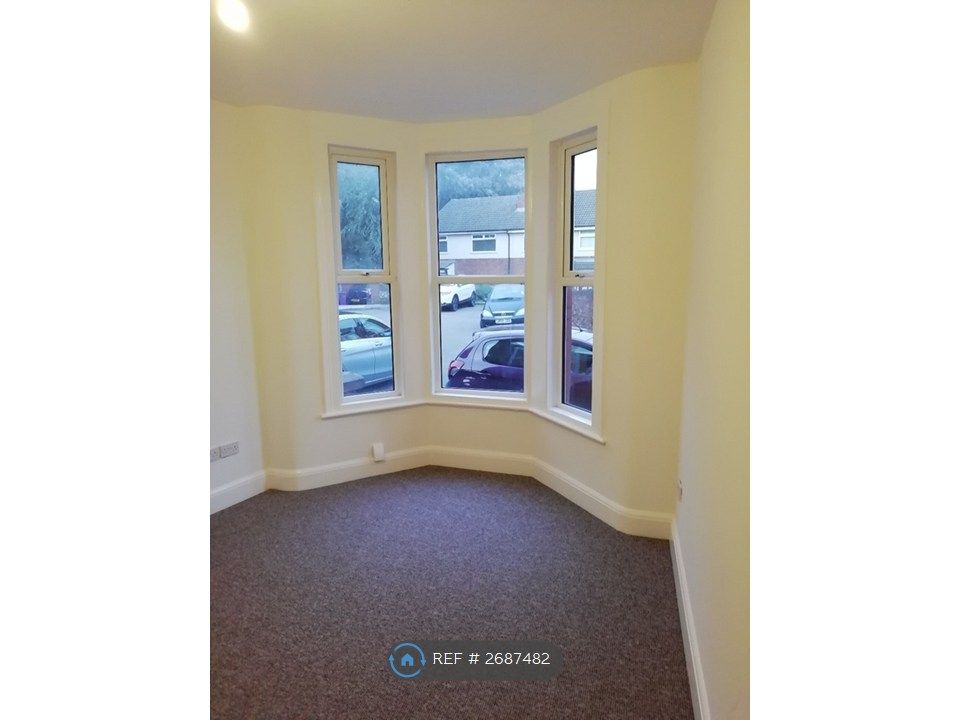 Property photo 3 of 16 Front Living Room