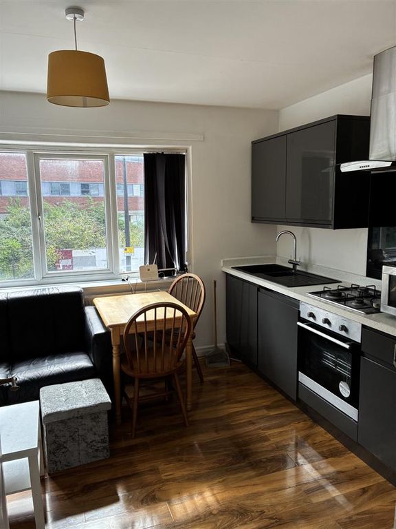 Property photo 1 of 7 Kitchen / Living Area