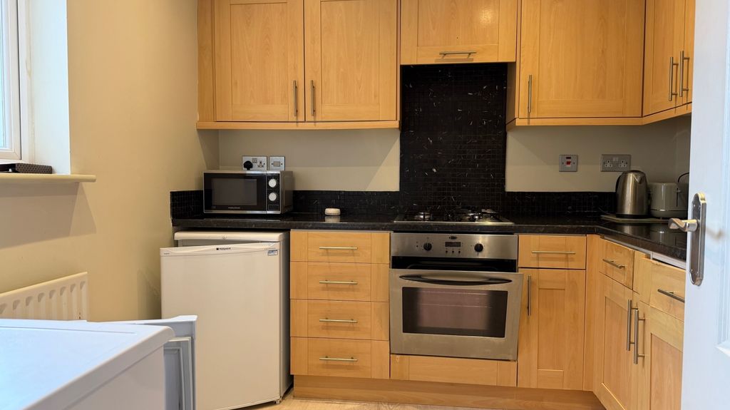 Property photo 2 of 12 Kitchen